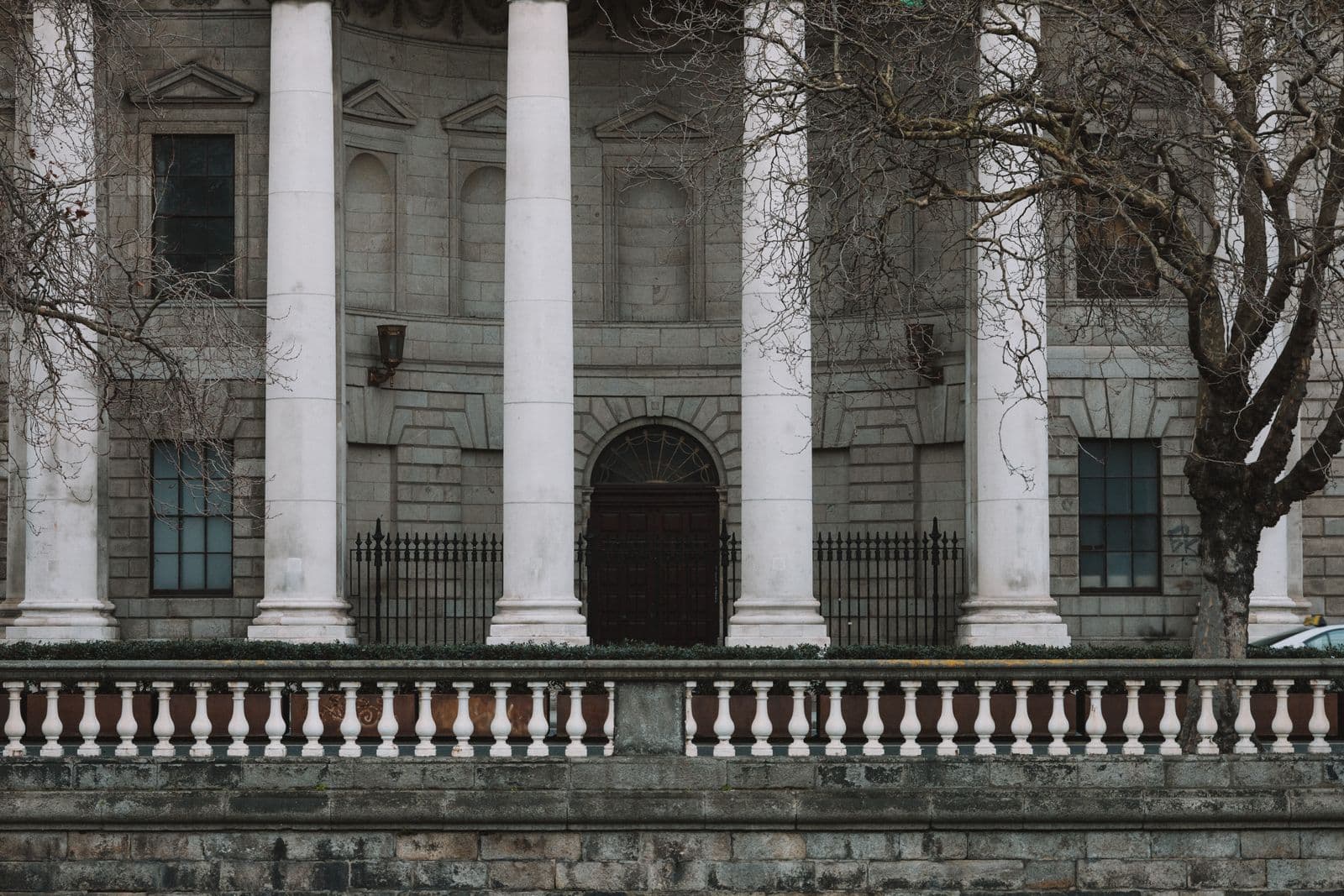 Grand courthouse building with imposing columns symbolizing law and justice