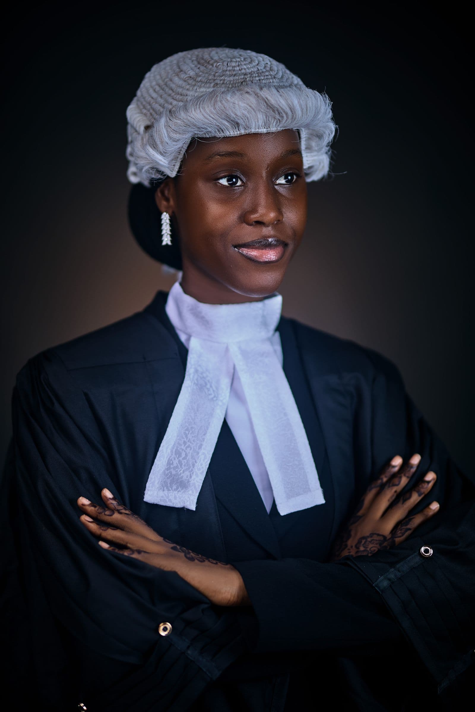 Portrait of a confident young lawyer in traditional legal attire