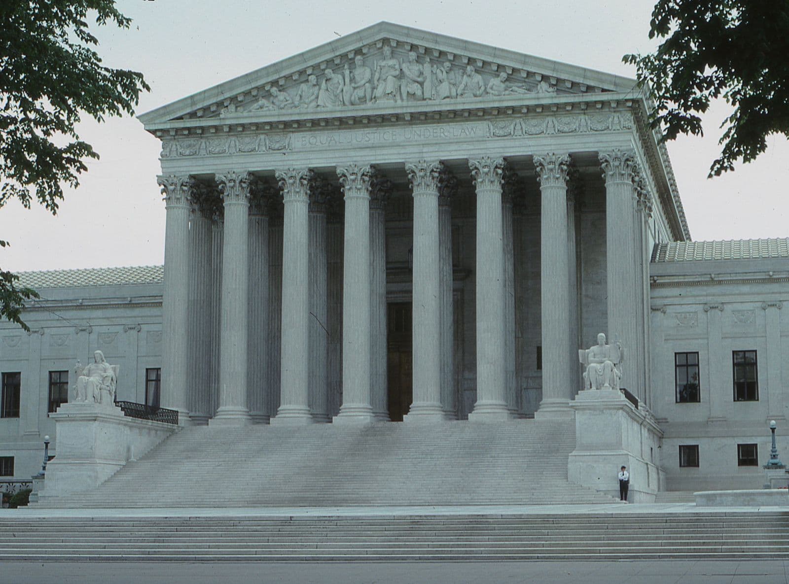 Grand courthouse building with imposing columns symbolizing law and justice